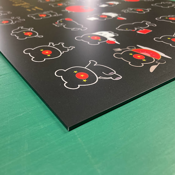 三ツ星tomatoのアルミ複合板看板の印刷シート巻き込み